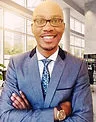 Smiling professional wearing glasses and formal shirt