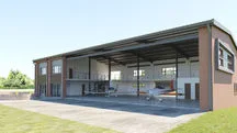 Large warehouse interior with natural daylighting through the roof